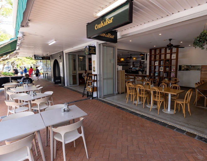 Conkabar's outdoors seating with tables and chairs on Connor St Burleigh Heads