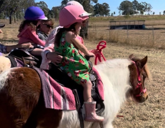 Kids horseriding at Harrisvale Sunday Farm Day 