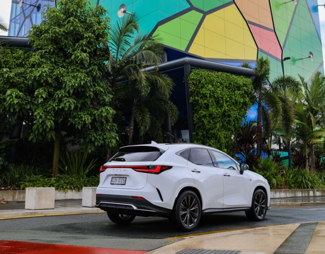 Lexus NX driving past HOTA Gallery