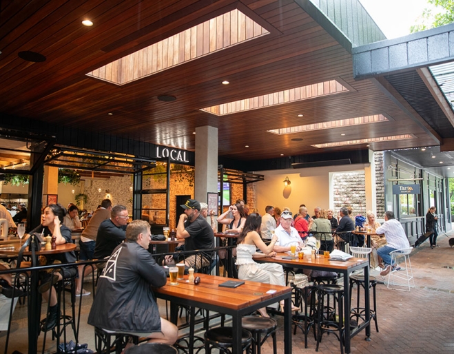People seated outside at Local Burleigh Heads