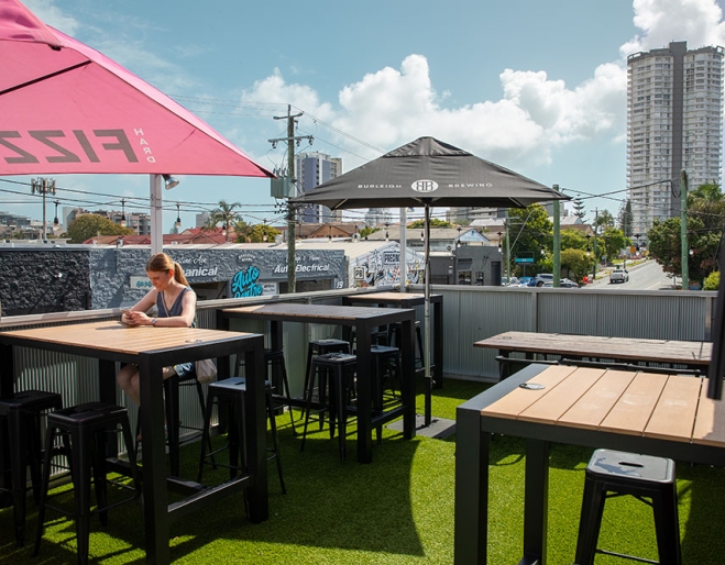 Rooftop seating with umbrellas