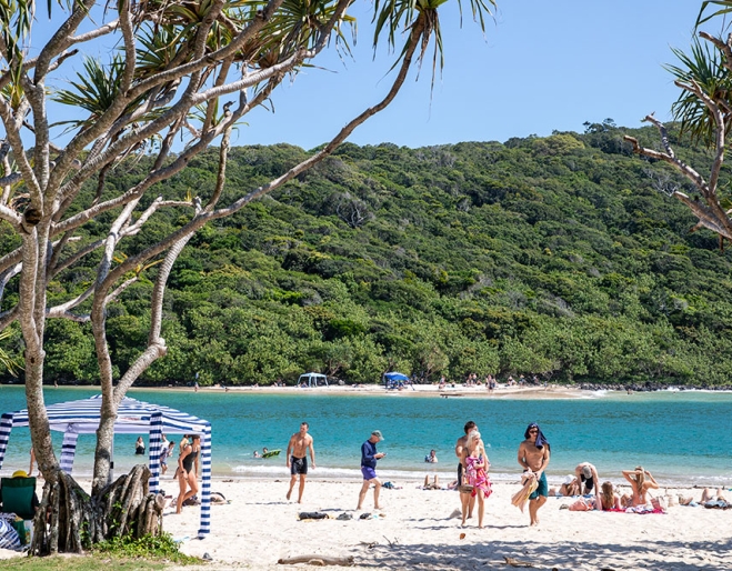 People on Tallebudgera Creek Beach
