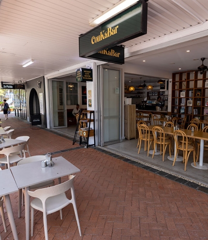 Conkabar's outdoors seating with tables and chairs on Connor St Burleigh Heads