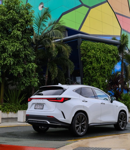 Lexus NX driving past HOTA Gallery