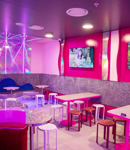 Internal venue with tables at Pink Whale Thai