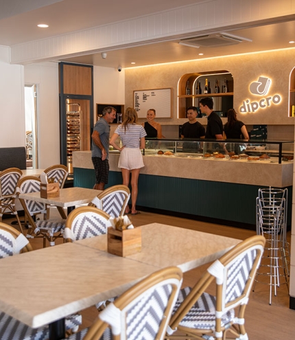 Internal venue shot with counter at Dipcro Pastry, Main Beach