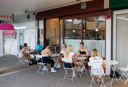 People sitting outside 94 Morning Club