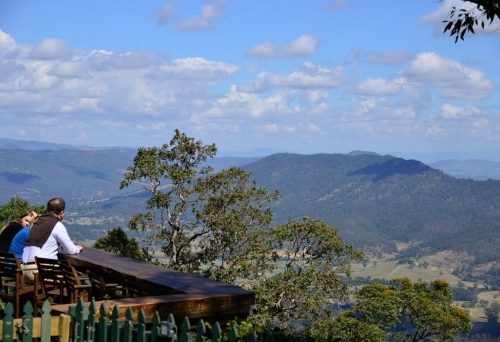 patrons sitting at table with views at The Polish Place in Mt Tamborine Qld