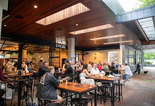 People seated outside at Local Burleigh Heads