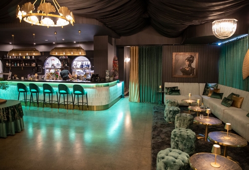 Bar and seating inside Madame V Palm Beach