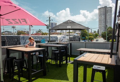 Rooftop seating with umbrellas