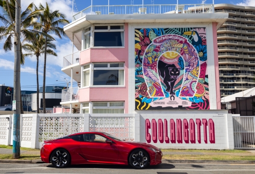 A red Lexus parked out the front of The Pink Hotel Coolangatta 