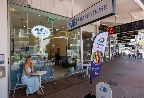 Woman seated outside Uni's Bakehouse