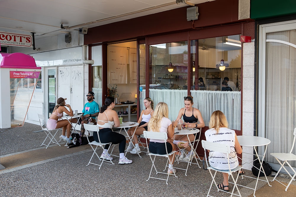 People sitting outside 94 Morning Club