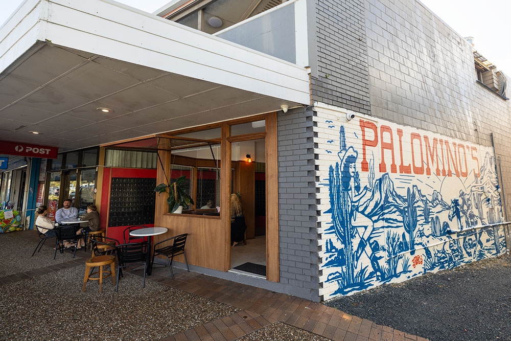 Side view with mural of Palomino's Deli