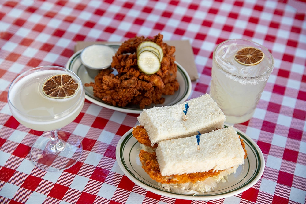 Sando, Chicken tenders and drinks on table