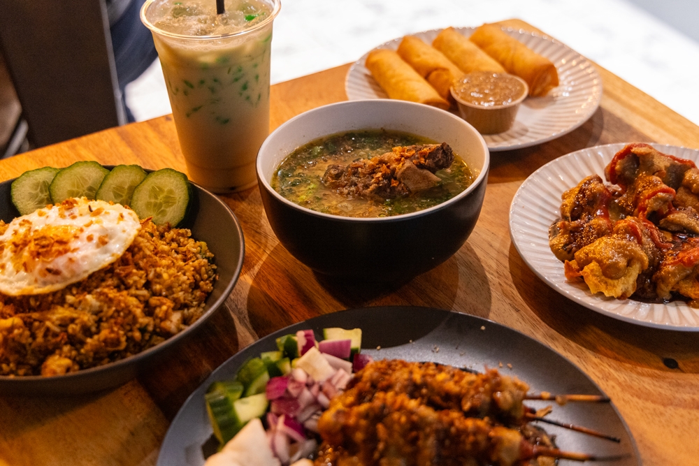 Plates of food on a table, Bali In Paradise Surfers Paradise 