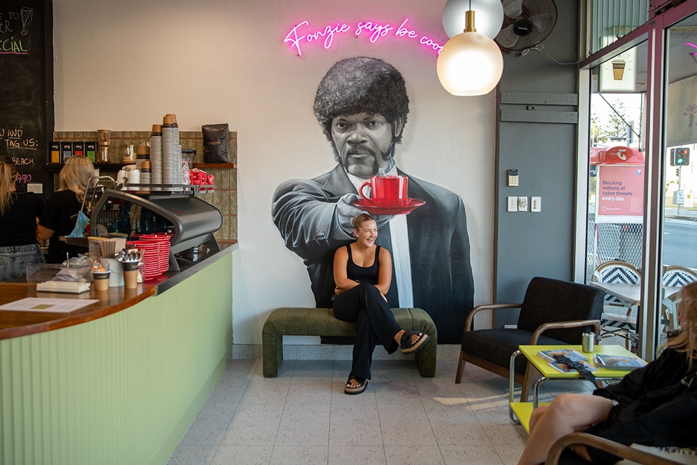 Pulp Fiction artwork on wall beside clounter, Bantr Cafe Palm Beach