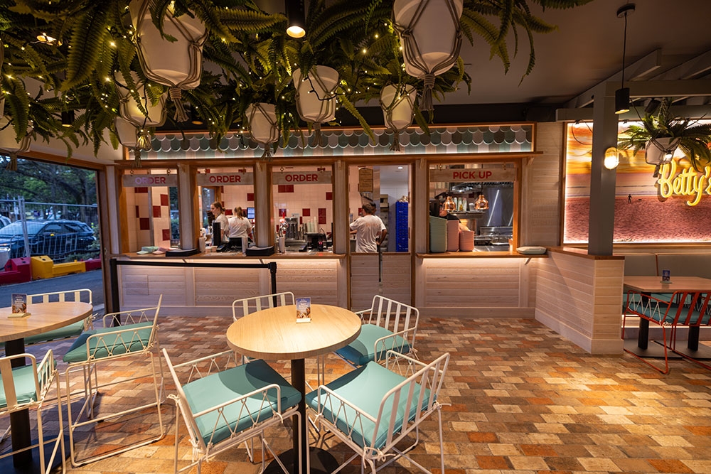 tables inside Betty's Burgers Palm Beach