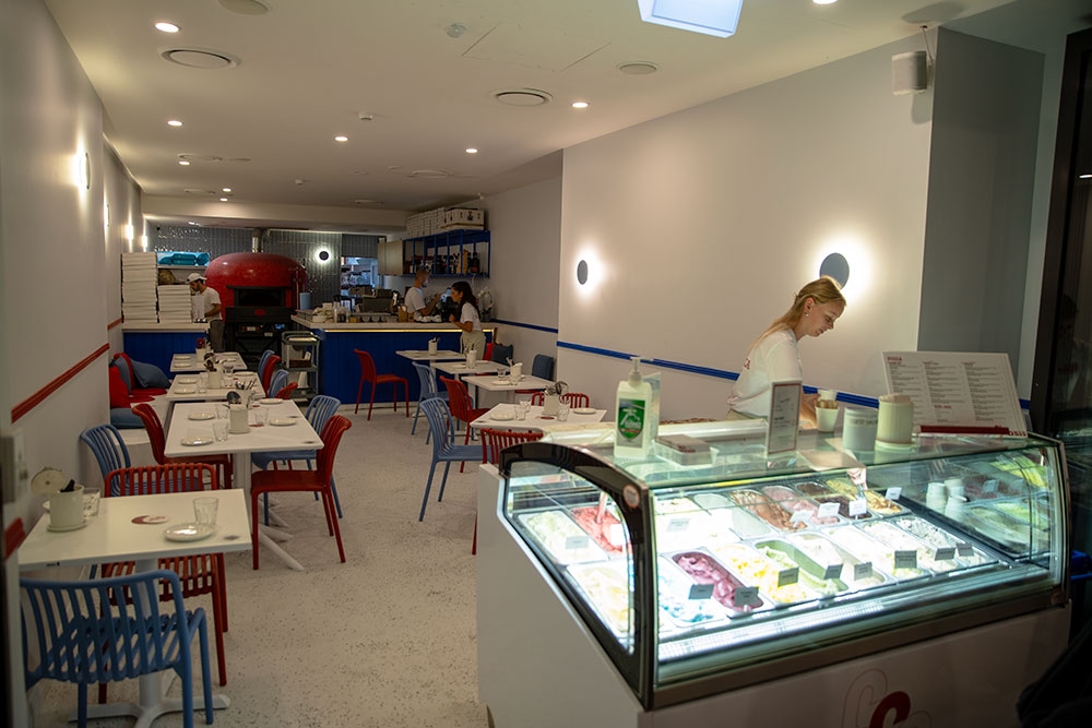 Gelato counter and tables inside Ciccio's Pizza & Gelato
