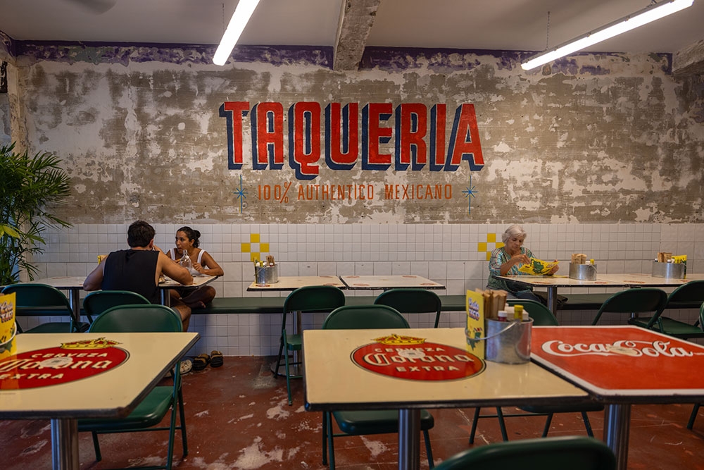 People seated in Costa Taco
