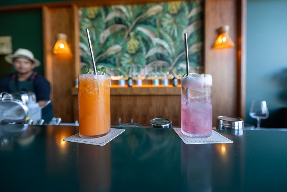 Cocktails on bar at  Familiar Spirits