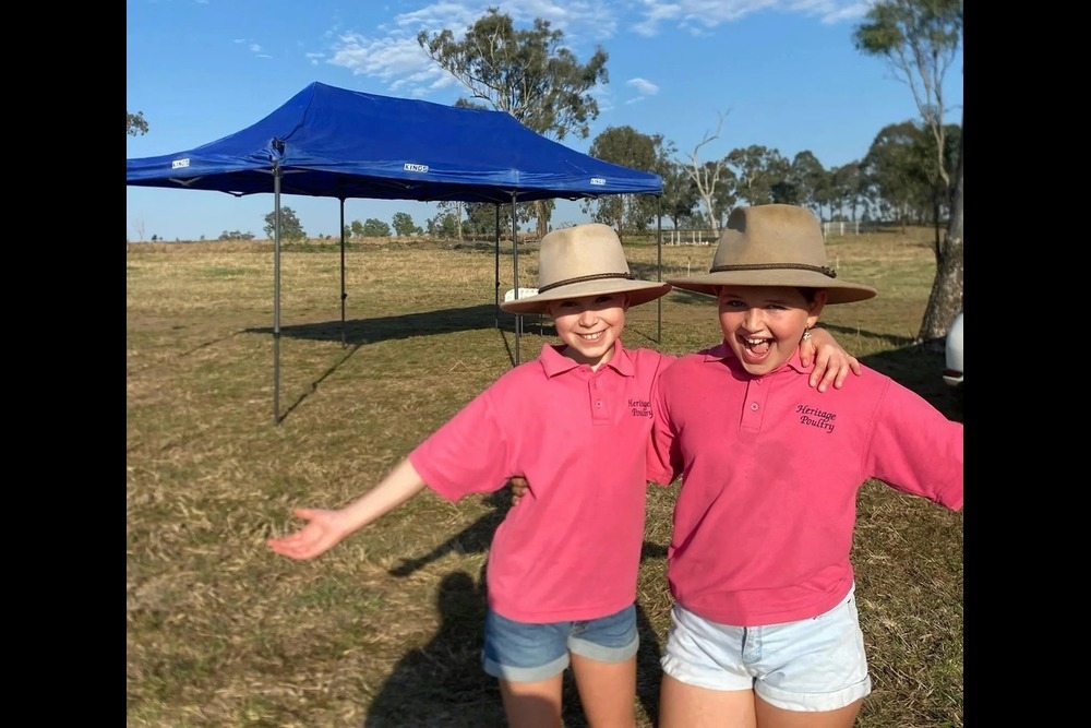 2 girls in Pink Shirts at Harrisvale Sunday Farm Day 