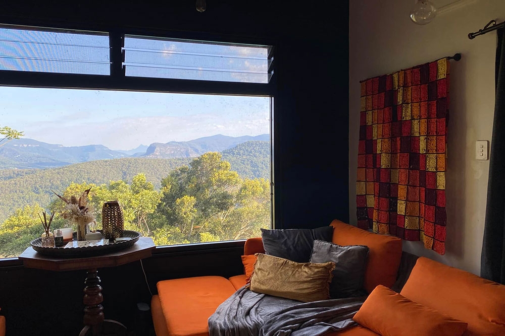 Living room with view in tiny House  The Jardin Collective Beechmont