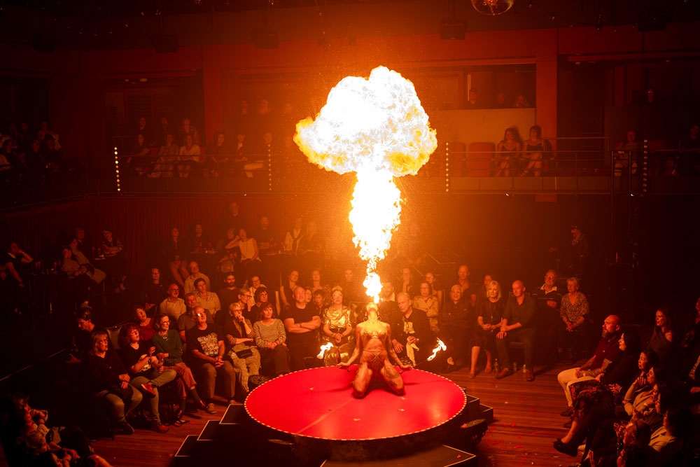 A woman blowing fire out of her mouth, La Clique HOTA 