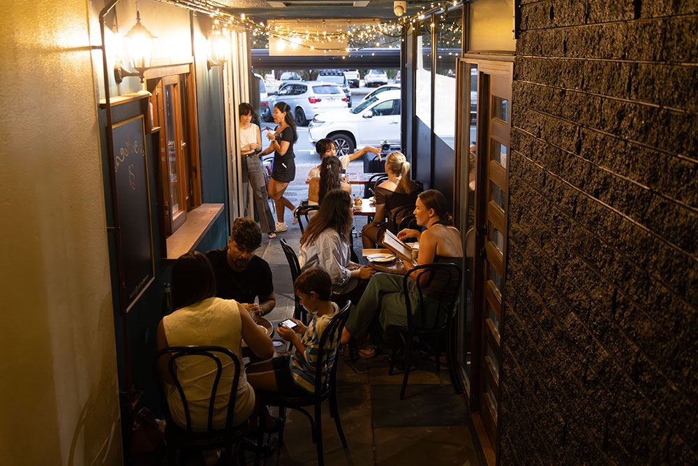 Diners in laneway La Stradina