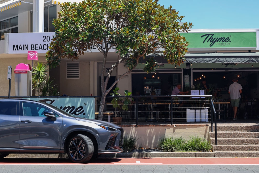 Lexus parked near restaurant