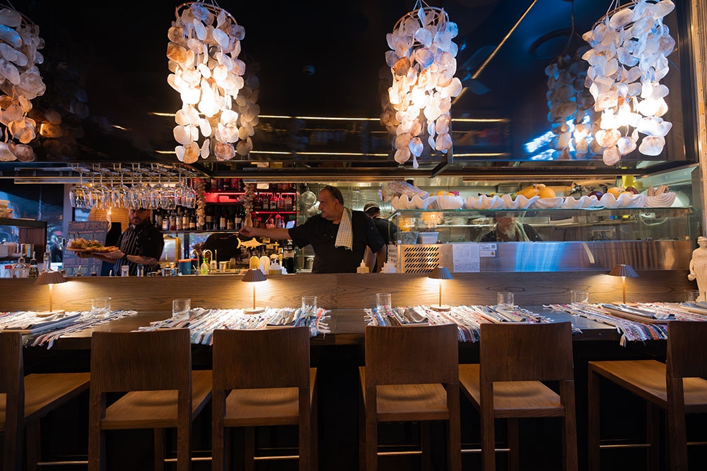 Seating near kitchen inside Manny's Wine & Fish Burleigh Heads