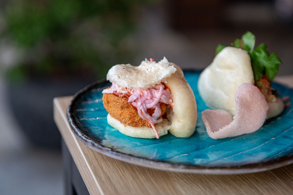 Bao on plate at Monsieur Chow Nobby Beach