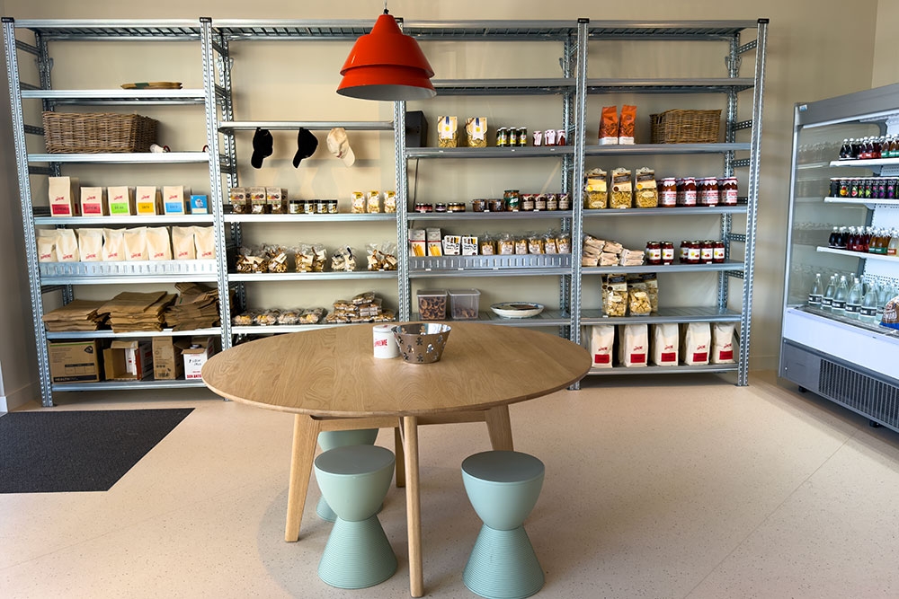 Fridges and table inside  Nico deli shop Kirra