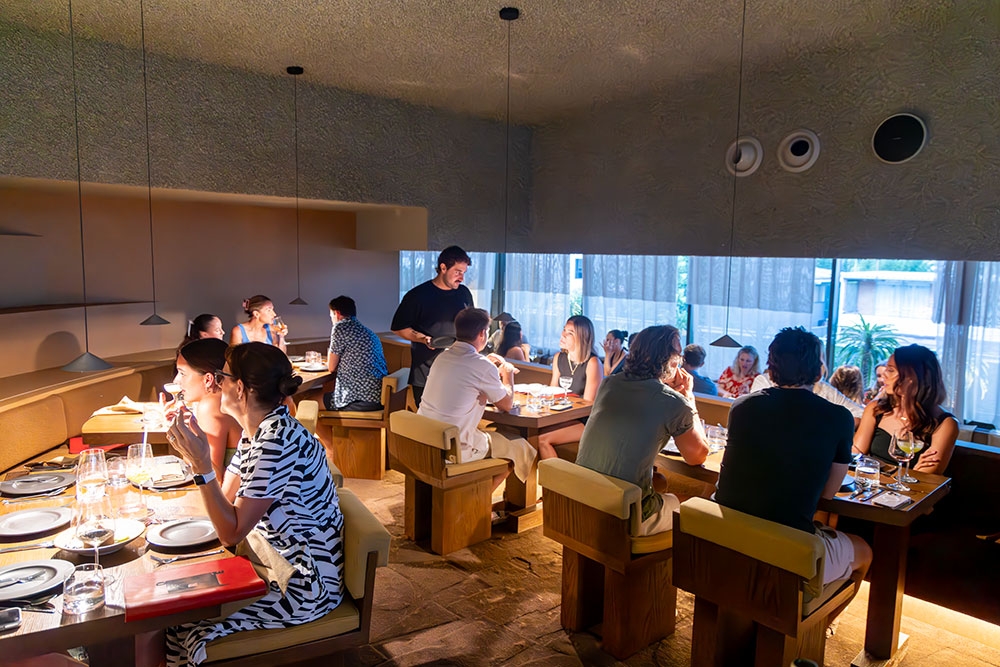 Diners at tables inside Norte