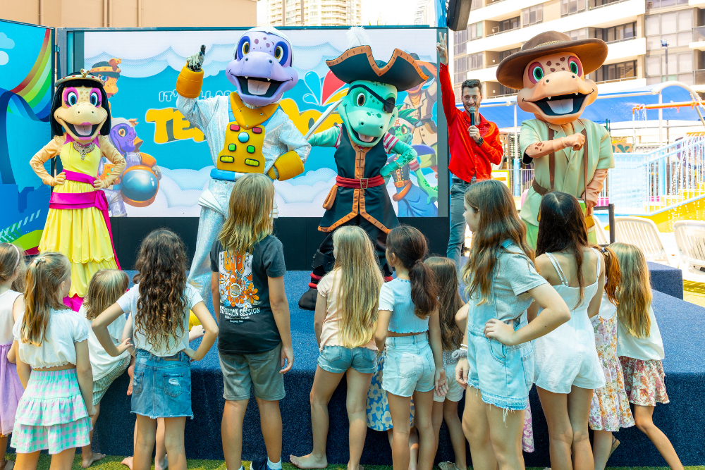 Children gathered around at Doin’ It for the Kids at Paradise Resort, Surfers Paradise