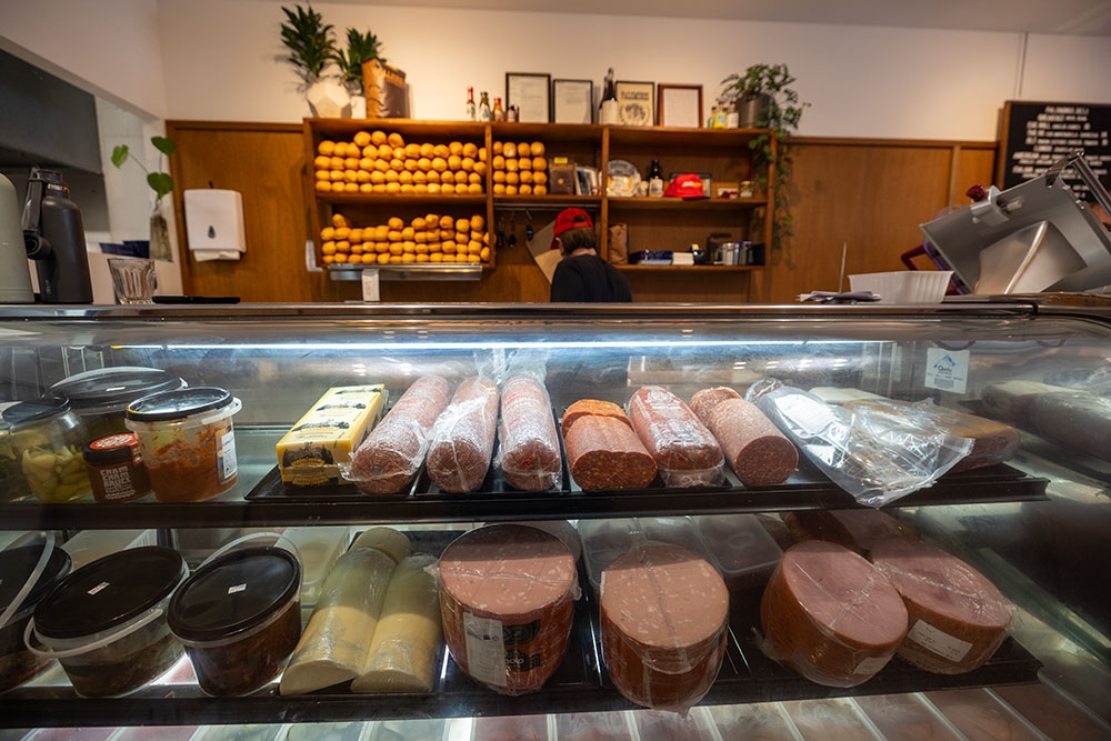 Counter of meats inside Palomino's Deli