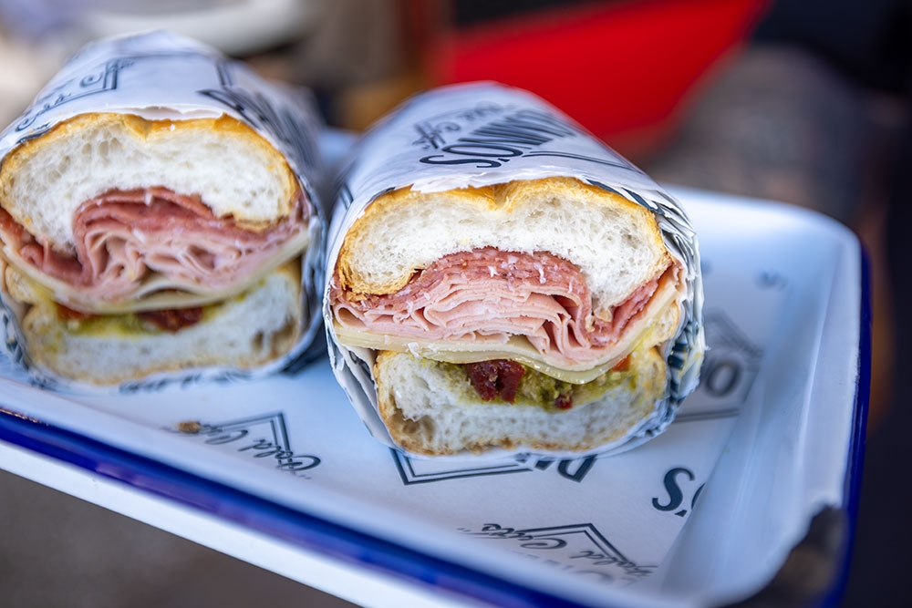 Italian and American sandwiches on tray at Palomino's Deli