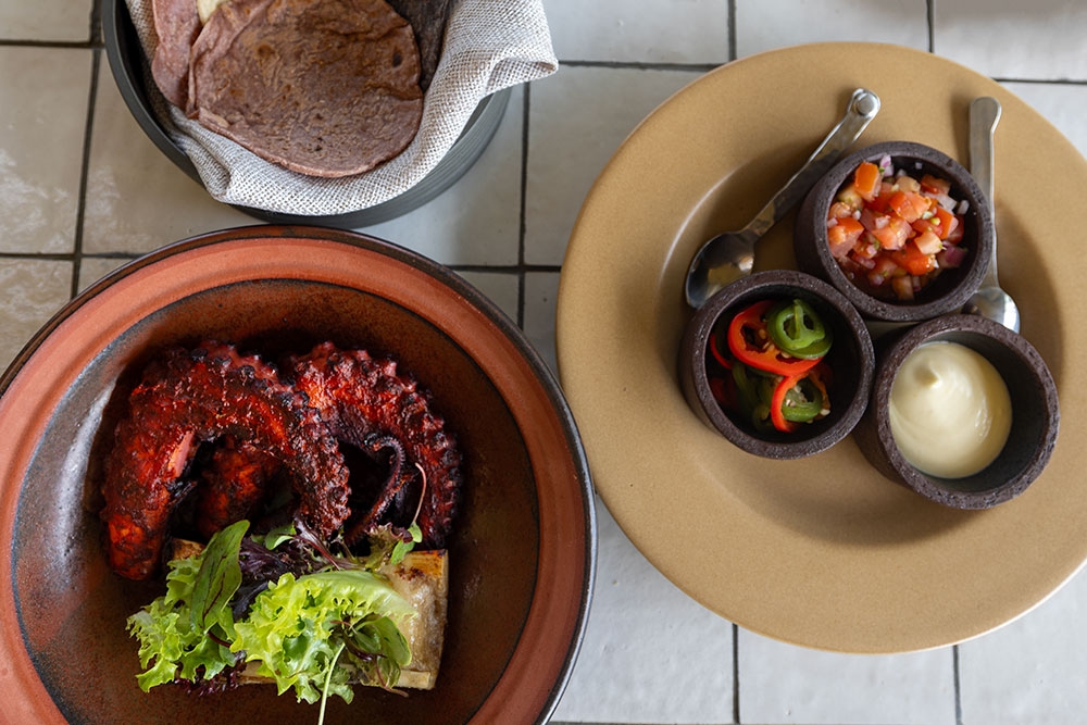 selection of asados on table at Sueño