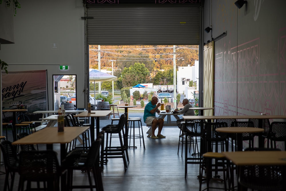 View of surrounding hills from inside Sunny Days Distillery