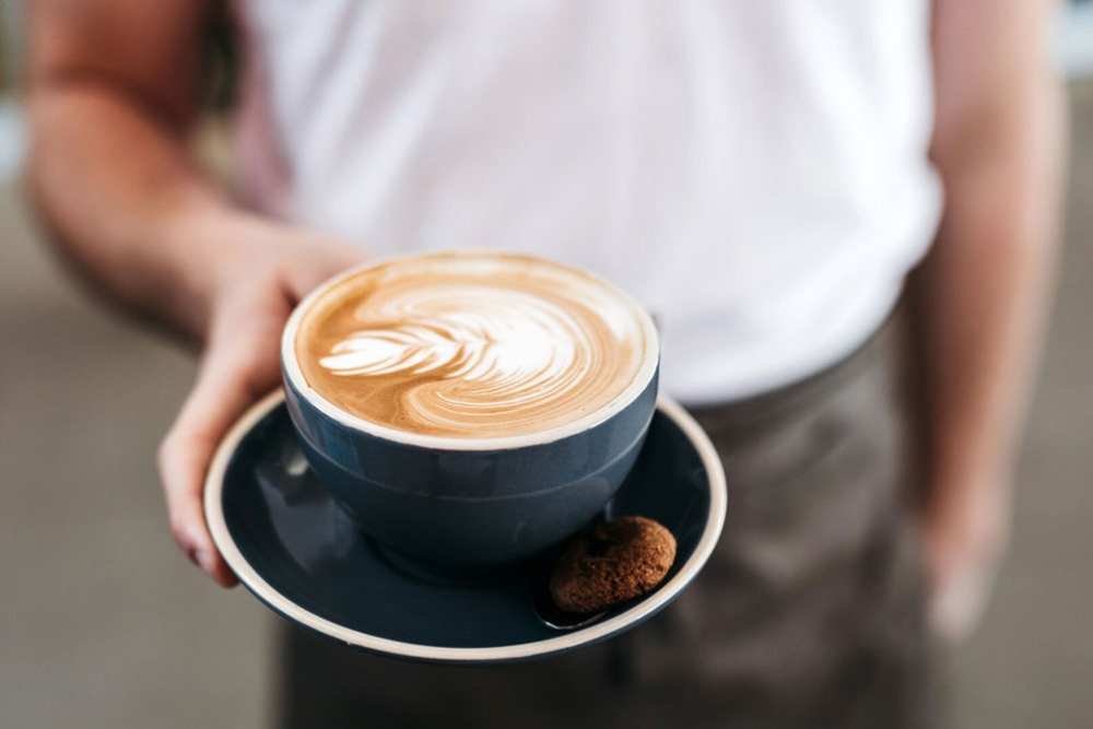 Man holding a cup of coffee
