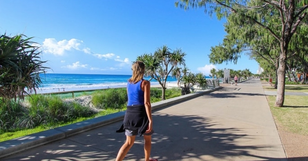 Woman walking Tugun Bulimba